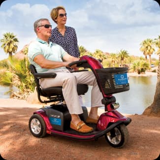 Couple using a Standard Electric Scooter